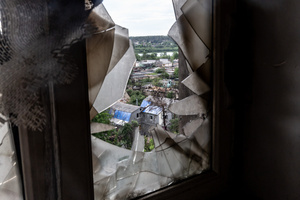 A view from an apartment in a residential building destroyed by bombardment. Four months after Russia launched its invasion of Ukraine, fighting has moved from areas around the capital Kyiv to eastern regions. Just 25 kilometers from Kyiv, however, the town of Irpin still bears the scars of heavy fighting and shelling, which reduced many buildings to ruins.