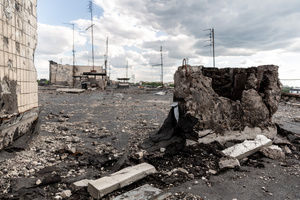 A roof of a residential building destroyed by bombardment. Four months after Russia launched its invasion of Ukraine, fighting has moved from areas around the capital Kyiv to eastern regions. Just 25 kilometers from Kyiv, however, the town of Irpin still bears the scars of heavy fighting and shelling, which reduced many buildings to ruins.