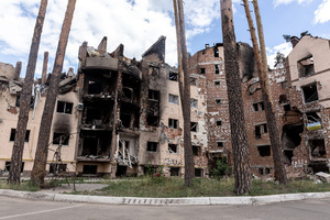 A view of a residential building destroyed by bombardment. Four months after Russia launched its invasion of Ukraine, fighting has moved from areas around the capital Kyiv to eastern regions. Just 25 kilometers from Kyiv, however, the town of Irpin still bears the scars of heavy fighting and shelling, which reduced many buildings to ruins.