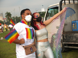 LGBTQ friends pose for photos during the Metro Manila Pride March. LGBTQ (Lesbian, Gay, Bisexual, Transgender and Queer) activists staged the annual Pride March and Festival at CCP Open Grounds in Pasay City.