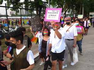 Participants march with placards expressing their opinion during the Metro Manila Pride March. LGBTQ (Lesbian, Gay, Bisexual, Transgender and Queer) activists staged the annual Pride March and Festival at CCP Open Grounds in Pasay City.