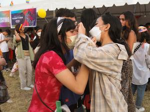 LGBTQ couple fixing their eyelashes together during the Metro Manila Pride March. LGBTQ (Lesbian, Gay, Bisexual, Transgender and Queer) activists staged the annual Pride March and Festival at CCP Open Grounds in Pasay City.