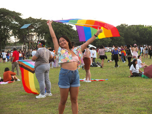 A participant waves a rainbow flag during the Metro Manila Pride March. LGBTQ (Lesbian, Gay, Bisexual, Transgender and Queer) activists staged the annual Pride March and Festival at CCP Open Grounds in Pasay City.