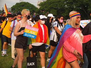 Participants march with LGBT flags and placards during the Metro Manila Pride March. LGBTQ (Lesbian, Gay, Bisexual, Transgender and Queer) activists staged the annual Pride March and Festival at CCP Open Grounds in Pasay City.