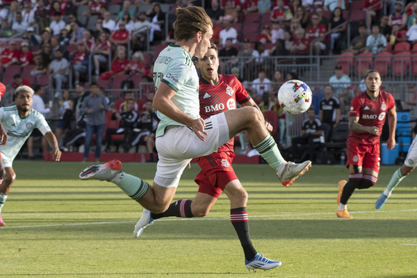 Luca Petrasso (38) and Aiden McFadden (37) in action during the MLS game between Toronto FC and Atlanta United FC at BMO Field. The game ended 2-1 for Toronto FC.