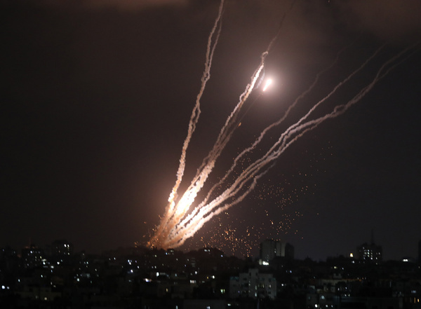 Rockets fired from Gaza City towards Israel, in response to Israeli air strikes on the Gaza Strip.