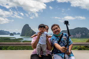 A family poses for a selfie before Phang Nga Bay in Phuket.