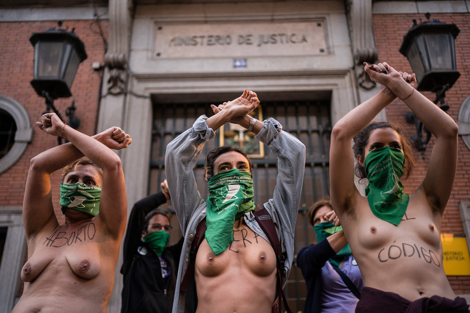(Editors note image contains nudity)
Topless women raise their arms during the demonstration. Feminist associations in Madrid join the international movement in favor of free abortion and demonstrated on the streets of downtown Madrid.