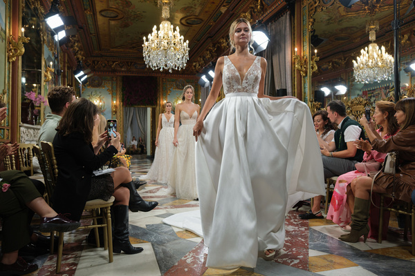 Models showcase creations by Andrea Lalanza during the Atelier Couture bridal catwalk within Madrid Fashion Week, held at Santa Isabel Palace in Madrid.