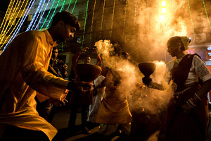 Hindu devotees perform dhunuchi dance on the occasion of Durga Puja immersion at Kolkata. Durga Puja, an annual festival that marks victory of good over evil is celebrated by Hindus all over India & abroad. It is an occasion of great enthusiasm and festivity for the Hindus. On the last day, the day of Bhashan or Vijoya Dashami images and idols are immersed in water.