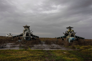 Damaged combat helicopters Mil Mi-24 is seen at the Kherson airport. Kherson airport was left with wreckage after Ukrainian troops attacked the base of the Russian forces during their occupation of the area. The Russian troops have fled and abandoned this strategic location.