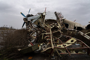 An airplane wreckage was seen at Kherson airport. Kherson airport was left with wreckage after Ukrainian troops attacked the base of the Russian forces during their occupation of the area. The Russian troops have fled and abandoned this strategic location.