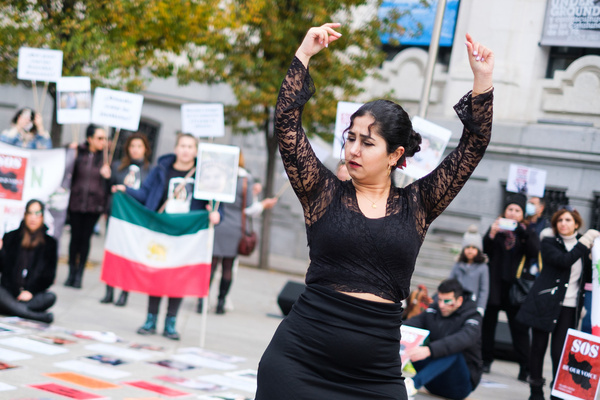 Artist Erika Suarez performs at Cibles square in Madrid during a protest to demand freedom in Iran and against the death of Iranian woman Mahsa Amini who was arrested on September 13 in the capital Tehran.