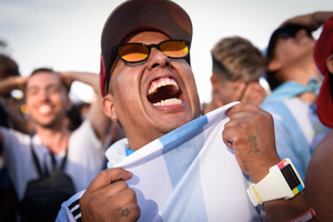 Argentina soccer fan celebrates as he watches FIFA World Cup round of 16 match against Australia at the World Cup, hosted by Qatar, in Buenos Aires. (Final scores; Argentina 2-1 Australia).