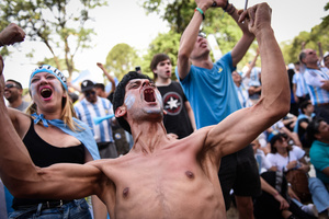 Argentina soccer fans celebrate as they watch FIFA World Cup round of 16 match against Australia at the World Cup, hosted by Qatar, in Buenos Aires. (Final scores; Argentina 2-1 Australia).