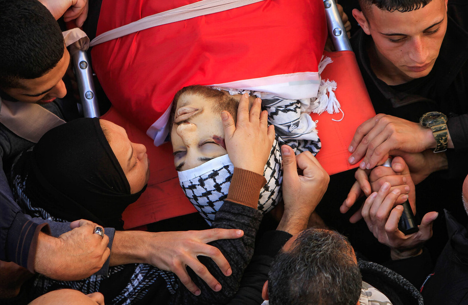 (EDITOR'S NOTE: Image depicts death)Mother of the Palestinian, Ahmed Amer Salem Abu Junaid, takes a last look at him and bids him farewell during his funeral in Balata refugee camp, east of Nablus, in the occupied West Bank. Abu Junaid who succumbed to his wounds after he was shot earlier during the clashes when Israeli forces stormed the Balata refugee camp, east of Nablus, in the occupied West Bank. He is the fifth Palestinian killed by Israeli forces in the West Bank since the start of the year.
