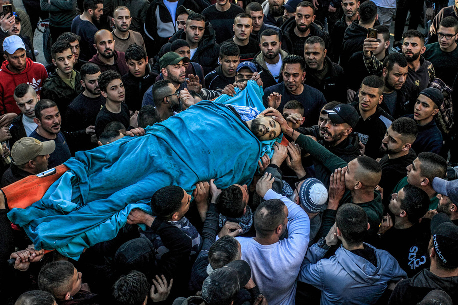 (EDITOR'S NOTE: Image depicts death)Mourners carry the body of one of the four Palestinians who were shot dead by the Israeli special forces in the city of Jenin in the occupied West Bank. An Israeli special force infiltrated the middle of the market in the city of Jenin and shot dead 4 Palestinians.