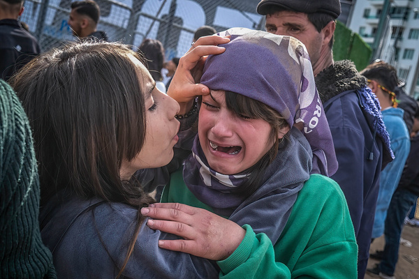 A girl affected by pepper spray seen crying during the clashes. Locals clashed with police during Newroz celebrations in Diyarbakir, the Kurdish people's capital city in Turkey. The police fired tear gas at protesters who were throwing stones. Newroz is a traditional Kurdish celebration marking the arrival of spring.