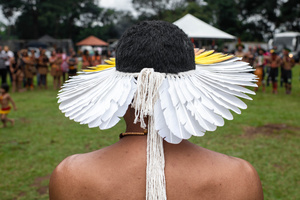 A woman seen wearing ornaments made out of natural elements during the celebrations of the Indigenous People’s Day, at the Aldeia Katurãma.