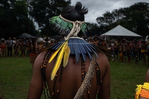 A man seen wearing ornaments made out of natural elements during the celebrations of the Indigenous People’s Day, at the Aldeia Katurãma.