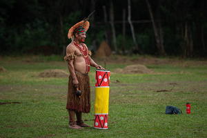 An indigenous man wears traditional outfits and ornaments during games at the celebrations of the Indigenous People’s Day, at the Aldeia Katurãma.