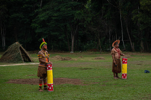 Indigenous men wearing traditional outfits and ornaments during games at the celebrations of the Indigenous People’s Day, at the Aldeia Katurãma.