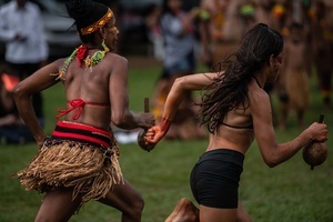 Indigenous women wearing traditional outfits and ornaments during games at the celebrations of the Indigenous People’s Day, at the Aldeia Katurãma.