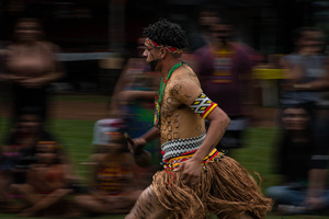 An indigenous man wearing traditional outfit and ornaments during a competition at the celebrations of the Indigenous People’s Day, at the Aldeia Katurãma.