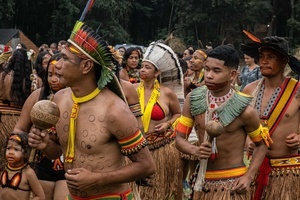 Chief Ãngohó Pataxó, an indigenous community leader, dances surrounded by other members of the Pataxó people during the celebrations of the Indigenous Peoples Day, at the Aldeia Katurãma.