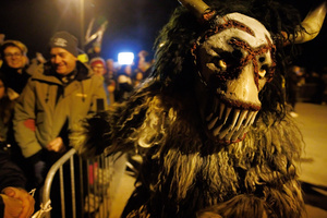 A Krampus participates in the Krampus run. More than 600 Krampuses from Slovenia, Austria, Italy, and Croatia joined the tenth anniversary of the Krampus run in Goričane. Krampus, a horned demon-like figure, traditionally works alongside Saint Nicholas or Santa Claus. While Santa rewards good children with gifts, Krampus scares and gives birch rods to misbehaving children. The Krampus run aims to remind both children and adults who haven't been well-behaved to improve their behavior before Christmas.