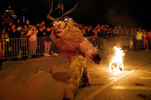 A Krampus drags a fireball during a Krampus run. More than 600 Krampuses from Slovenia, Austria, Italy, and Croatia joined the tenth anniversary of the Krampus run in Goričane. Krampus, a horned demon-like figure, traditionally works alongside Saint Nicholas or Santa Claus. While Santa rewards good children with gifts, Krampus scares and gives birch rods to misbehaving children. The Krampus run aims to remind both children and adults who haven't been well-behaved to improve their behavior before Christmas.