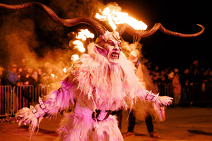 A Krampus performs during the Krampus run. More than 600 Krampuses from Slovenia, Austria, Italy, and Croatia joined the tenth anniversary of the Krampus run in Goričane. Krampus, a horned demon-like figure, traditionally works alongside Saint Nicholas or Santa Claus. While Santa rewards good children with gifts, Krampus scares and gives birch rods to misbehaving children. The Krampus run aims to remind both children and adults who haven't been well-behaved to improve their behavior before Christmas.