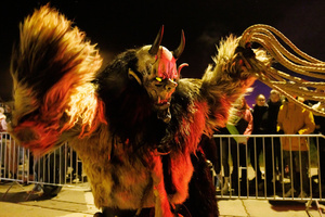 A Krampus performs during a Krampus run. More than 600 Krampuses from Slovenia, Austria, Italy, and Croatia joined the tenth anniversary of the Krampus run in Goričane. Krampus, a horned demon-like figure, traditionally works alongside Saint Nicholas or Santa Claus. While Santa rewards good children with gifts, Krampus scares and gives birch rods to misbehaving children. The Krampus run aims to remind both children and adults who haven't been well-behaved to improve their behavior before Christmas.