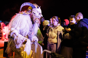A Krampus scares the audience during a Krampus run. More than 600 Krampuses from Slovenia, Austria, Italy, and Croatia joined the tenth anniversary of the Krampus run in Goričane. Krampus, a horned demon-like figure, traditionally works alongside Saint Nicholas or Santa Claus. While Santa rewards good children with gifts, Krampus scares and gives birch rods to misbehaving children. The Krampus run aims to remind both children and adults who haven't been well-behaved to improve their behavior before Christmas.