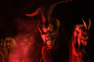A Krampus performs during a Krampus run. More than 600 Krampuses from Slovenia, Austria, Italy, and Croatia joined the tenth anniversary of the Krampus run in Goričane. Krampus, a horned demon-like figure, traditionally works alongside Saint Nicholas or Santa Claus. While Santa rewards good children with gifts, Krampus scares and gives birch rods to misbehaving children. The Krampus run aims to remind both children and adults who haven't been well-behaved to improve their behavior before Christmas.