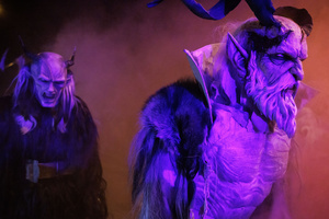 Krampusse walk by during a Krampus run. More than 600 Krampuses from Slovenia, Austria, Italy, and Croatia joined the tenth anniversary of the Krampus run in Goričane. Krampus, a horned demon-like figure, traditionally works alongside Saint Nicholas or Santa Claus. While Santa rewards good children with gifts, Krampus scares and gives birch rods to misbehaving children. The Krampus run aims to remind both children and adults who haven't been well-behaved to improve their behavior before Christmas.