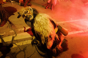 A Krampus performs during a Krampus run. More than 600 Krampuses from Slovenia, Austria, Italy, and Croatia joined the tenth anniversary of the Krampus run in Goričane. Krampus, a horned demon-like figure, traditionally works alongside Saint Nicholas or Santa Claus. While Santa rewards good children with gifts, Krampus scares and gives birch rods to misbehaving children. The Krampus run aims to remind both children and adults who haven't been well-behaved to improve their behavior before Christmas.