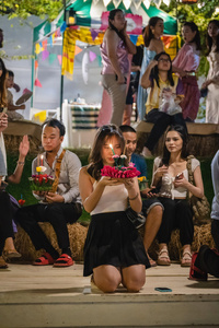 People are seen with their krathongs on the bank of the lake during the Magical Loy Krathong Festival at Jodd Fairs Dan Neramit in Bangkok. Loy Krathong, Thailand's Festival of Lights, is celebrated annually across Thailand and nearby regions. During this festival, people float decorated baskets made of banana leaves, incense sticks, and candles on rivers, canals, or ponds. They make wishes as they release these floating offerings.