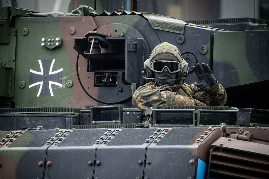 German soldier participates in a military parade during Armed Forces Day in Vilnius. Armed Forces Day honours the restoration of the Lithuania armed forces on November 23, 1918. The military parade commemorating the holiday is being held this year on November 25 in Vilnius. Both Lithuanian military and allies from NATO countries took part in the parade, totaling about 1,400 people and 100 pieces of military equipment.