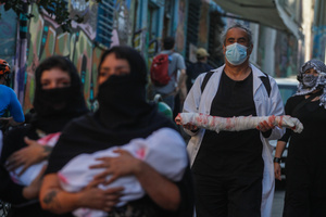 Protesters carry dummy baby wrapped in fake blood-stained cloth during the demonstration. Protesters participate in a rally in the city of Valparaiso in Chile to mark the International Day of Solidarity with the Palestinian People, condemning Israel’s war on Gaza and calling for a permanent ceasefire. This day is observed annually on November 29 to remember Resolution 181, when the UN decided in 1947 to divide Palestine into two separate Jewish and Arab states.