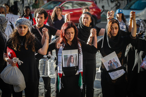 Protesters take part during the demonstration. Protesters participate in a rally in the city of Valparaiso in Chile to mark the International Day of Solidarity with the Palestinian People, condemning Israel’s war on Gaza and calling for a permanent ceasefire. This day is observed annually on November 29 to remember Resolution 181, when the UN decided in 1947 to divide Palestine into two separate Jewish and Arab states.