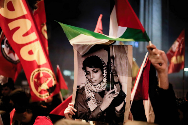 Protesters hold a portrait of Palestinian activist Leila Khaled in solidarity with the Palestinian people during the demonstration. The Turkish Workers' Party organized a protest in front of the Israeli consulate in Istanbul. Participants called for an end to the Israeli occupation and the lifting of the siege on Gaza.