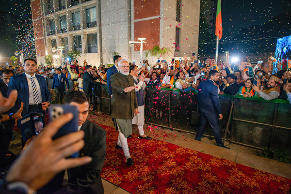 India's Prime Minister and BJP leader, Narendra Modi, is seen moving towards the stage where Modi will address party workers after the victory in the Madhya Pradesh, Chhattisgarh, and Rajasthan Assembly elections at the BJP Headquarters. In India recently, four state assembly elections took place, and the Bharatiya Janata Party (BJP) will form the government in Madhya Pradesh, Chhattisgarh, and Rajasthan.