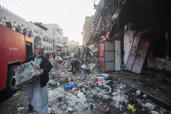 A Palestinian man inspects the destruction caused by Israeli air strikes on their homes in Khan Yunis in Gaza. Despite the diplomatic talks and the release of captives, the sustained truce between Israel and Hamas did not hold longer than a week. In response, Israel has escalated its military operations in Gaza.