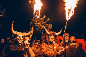 The Felos (carnival revellers of Maceda) seen wearing wooden masks and horns while holding burning torch during the "Baixada da Marela" parade. "At Entrudo (Carnival), in the village of Maceda (Galicia - northern Spain) the villagers dress up as Felos and during the day they parade through the neighboring villages, during the night they do the "Baixada da Marela", they change clothes and wear horns and animal skins and parade with carts through the streets of Maceda, carrying torches, thorny snot and throwing flour at the visitors!".