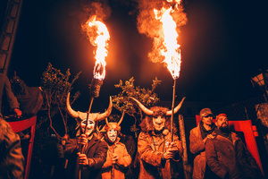 The Felos (carnival revellers of Maceda) seen wearing wooden masks and horns while holding burning torch during the "Baixada da Marela" parade. "At Entrudo (Carnival), in the village of Maceda (Galicia - northern Spain) the villagers dress up as Felos and during the day they parade through the neighboring villages, during the night they do the "Baixada da Marela", they change clothes and wear horns and animal skins and parade with carts through the streets of Maceda, carrying torches, thorny snot and throwing flour at the visitors!".