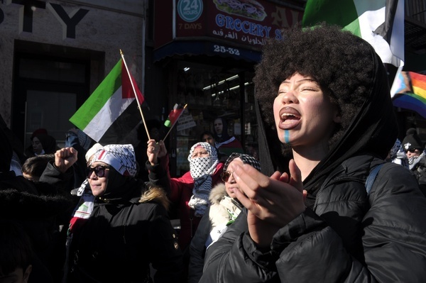 Pro-Palestine demonstrators chant slogans and wave Palestinian flags at a rally. Demonstrators marched in Astoria, Queens, New York City demanding a ceasefire of Israel's military operations in Gaza. Israeli Prime Minister Benjamin Netanyahu and the Israel Defense Forces have said their military will soon enter the southern town of Rafah in Gaza. More than half of Gaza's 2.3 million population are sheltered in Rafah living in tents and U.N. shelters. According to Gaza's Health Ministry, more than 29,000 people have been killed in Gaza since the war started on October 7, 2023.