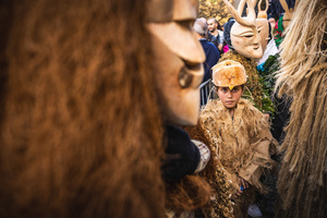 A girl dressed as Careto seen during the Carnival parade in Lazarim. In Lazarim, northern Portugal, the carnival is celebrated with a tradition known as Entrudo. During this festivity, masks of devils and demons, intricately carved in wood by the village's craftsmen, are prominently featured. The carnival parade through the streets showcases these masks, portraying ancestral scenes of Portuguese culture.