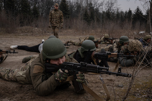 A military instructor inspects a group of trainees in a shooting position in a training organised by the third separate assault brigade in Kyiv region. Ukraine is facing a shortage of ammunition and military personnel. Aside from a tougher mobilisation law is under way, some brigades in the country have chosen a more encouraging approach to recruit people without previous military experience to join the army. The third separate assault brigade offers a 7-day free training course advertises to allow participants to have a taste of military training, enabling them to find their place in the army according to their skills and ability. Participants here are as young as 18 years old. 

When the war between Ukraine and Russia grind on for the second year mark, Ukraine president Volodymyr Zelensky revealed in last December the military wants to mobilise an extra 500,000 people.
