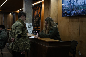 A military officer from the third separate assault brigade is seen doing recruitment job in Kyiv region. Ukraine is facing a shortage of ammunition and military personnel. Aside from a tougher mobilisation law is under way, some brigades in the country have chosen a more encouraging approach to recruit people without previous military experience to join the army. The third separate assault brigade offers a 7-day free training course advertises to allow participants to have a taste of military training, enabling them to find their place in the army according to their skills and ability. Participants here are as young as 18 years old. 

When the war between Ukraine and Russia grind on for the second year mark, Ukraine president Volodymyr Zelensky revealed in last December the military wants to mobilise an extra 500,000 people.
